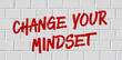  Graffiti on a brick wall - Change your mindset