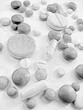 © Studio-M - Black and white pills, medicine background. Tablets prescribed for different diseases, health care background, monochrome pills. Hand drawn pencil sketch illustration