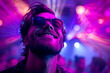 © Outsiderzone - Vibrant Nightlife Portrait: Smiling Man in Club with Purple and Pink Laser Lights, Rocking Sunglasses