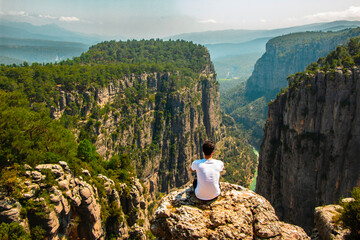 Canvas Print - Man watching nature view. Magnificent view and majestic cliff of Tazi Canyon. View of the valley from above. Antalya, Turkey.