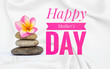 Happy Mother's say banner with plumeria flower on stone on white fabric background, Mother's day greeting card background idea