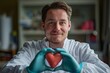 © Michael - Doctor holding heart in hands, health concept