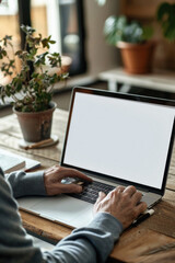 Business person working online or learning using laptop mock up blank white empty screen, hands typing on computer background close up view. Mockup display for ads. Close up view.