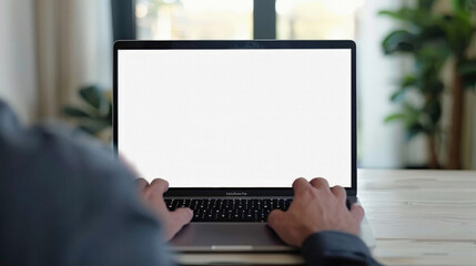Business person working online or learning using laptop mock up blank white empty screen, hands typing on computer background close up view. Mockup display for ads. Close up view.