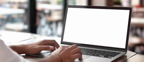 Business person working online or learning using laptop mock up blank white empty screen, hands typing on computer background close up view. Mockup display for ads. Close up view.