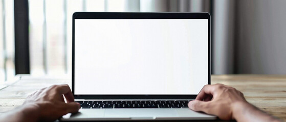 Business person working online or learning using laptop mock up blank white empty screen, hands typing on computer background close up view. Mockup display for ads. Close up view.