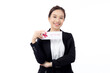 Portrait happiness beautiful young asian businesswoman showing and present gift voucher or coupon with satisfied isolated white background, business woman shopping, discount sale and promotion.
