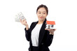 Portrait young asian businesswoman holding house and money for mortgage isolated white background, agent insurance business woman holding home for investment and presenting, business and finance.
