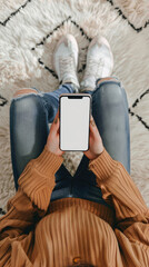 Wall Mural - Business person man or woman holding smartphone showing mock up blank white empty mobile phone screen, hands using cellphone close up view. Mockup display for applications ads.