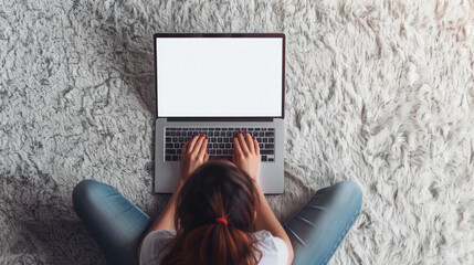 Wall Mural - Business woman or female student working online or learning using laptop mock up blank white empty screen, typing on computer background at home office. Mockup display for ads.