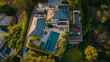 Luxurious Aerial View of a Modern Mansion at Dusk