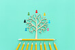 image of pencils and tree with people figures. human resources, leadership, education concept