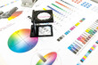 © kowitstockphoto - The magnifying glass standing on a leaf of the test print. Press color management - print production
