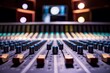A vibrant sound mixing console with knobs and sliders against dark background