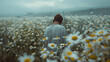 The mysterious presence of a man surrounded by a dense fog and a field of daisies evokes a sense of solitude and introspection