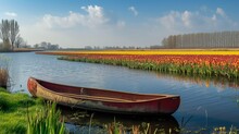 A Single Boat On A Small Lake In Keukenhof Flower Garden In Netherlands