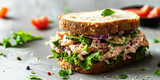 Fototapeta Zwierzęta - Tuna salad sandwich on the table
