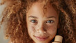 smiling african girl with curly hair and curly hairstyle