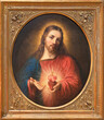 MILAN, ITALY - MARCH 4, 2024: The painting of Heart of Jesus in the church Santuario di San Giuseppe by unknown artist of 19. cent.
