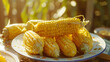 Yellow and fresh boiled corn cobs on a plate