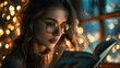 The image features a young woman with wavy hair wearing round, oversized glasses. She is gazing intently at a book that she holds in her hands, which is partially visible in the foreground. The settin