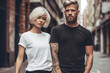 © Lusi_mila - Man and woman wearing blank white and black t-shirt