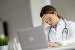 Female Doctor Advising Patient Online