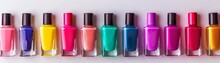 Nail Polish Bottles In A Rainbow Of Colors Offer The Allure Of Perfectly Manicured Hands With A Personal Touch, With Copy Space