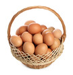 Chicken eggs in wicker basket isolated on white