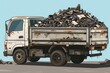 A white truck overflowing with miscellaneous items, suitable for various concepts and designs