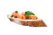 Tasty canape with salmon, capers and cream cheese isolated on white