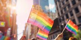 Fototapeta  - an outdoor pride event shows people holding rainbow flags