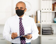 Businessman or office worker are working and wear mask for protect Covid-19 or corona virus disease , healthcare concept