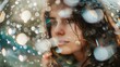 The image shows half of a woman's face, partially obscured by a multitude of out-of-focus droplets that scatter light, creating a bokeh effect. The woman's visible eye gazes calmly straight ahead, and