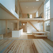 Interior of a wooden two-story house, stairs to the second floor, open spaces. Finished in light pine wood.