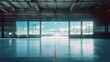 Interior view of empty airport hangar space - Vast empty interior of an airport hangar looking out to a sunny blue sky, representing potential and opportunity