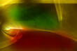 © ElenaEmiliya - Red green yellow colored abstract background with light caustic effect. Light passes through a glass. Blurred multicolored  light refraction texture overlay.