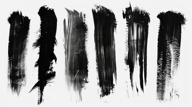 set of long black brush strokes on a white background
