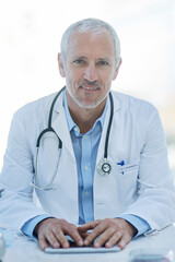 Poster - Doctor, mature and portrait with tablet for hospital consulting with stethoscope, cardiology or research. Male person, face and desk for future telehealth or online connection, life insurance or app