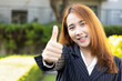 Asian office worker woman showing accepting thumb up gesture, concept image for good job, acceptance, approving action, work with success, done deal, accomplishment, position promotion