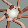 © peopleimages.com - Hands, wrist and together with circle in studio for synergy or collaboration with respect and diversity with harmony. Team, holding and connection in solidarity or alliance, trust and grey background