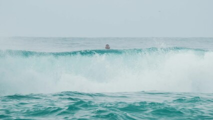 Poster - Ocean wave breaks on the shore