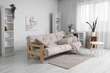 Sticker - Beautiful interior of living room with cozy sofa, shelving units and coffee table