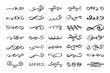 © Yanka - Vintage flourishes, swirls, curls, scrolls set. Calligraphic doodle design elements. Hand drawn