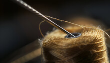 Sewing Needle And Spool