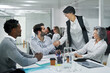 © peopleimages.com - Business people, handshake and team with meeting for greeting, introduction or agreement at office. Happy group of employees shaking hands for b2b partnership, deal or creative startup at workplace