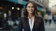 © Neha - Young and successful businesswoman standing outdoor