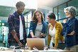 © peopleimages.com - Laptop, happy group and creative business people brainstorming, discussion or planning in startup with manager. Computer, diverse team or collaboration for strategy, meeting or copywriter training