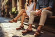 summer holidays and dating concept - couple in the city , men wearing loafers and women wearing sandals