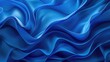 Abstract stylish smooth modern blue wave pattern background ,Light blue color glossy silk satin cloth wavy texture background, Close up of a soft Satin Texture in royal blue Colors,Elegant Background
